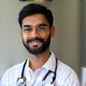 Rajiv Kumar smiling at clinic